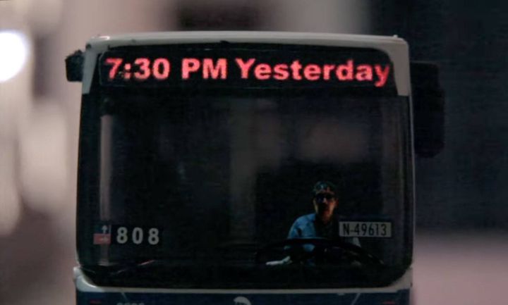 Still of a bus from a music video